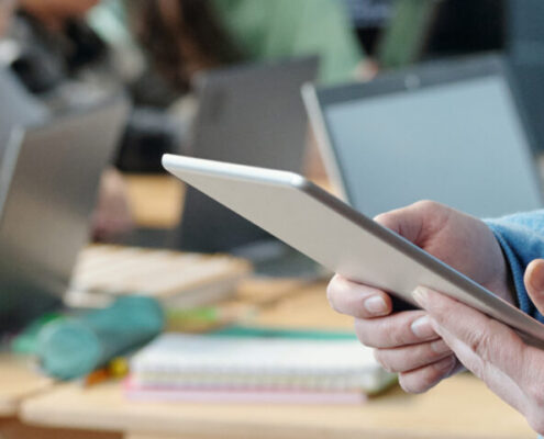 Teaching Students Technology With Tablet In Classroom