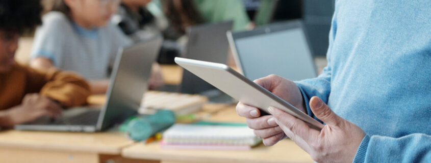 Teaching Students Technology With Tablet In Classroom